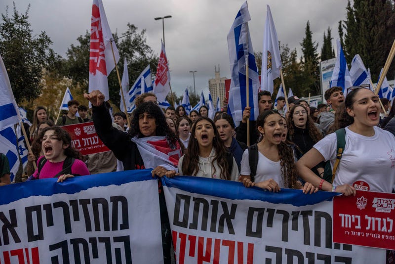 Israeli youth, led by Israeli Scouts from Kibbutz Kfar Aza, protest for the release of hostages held in Gaza on December 28, 2023 in Jerusalem, Israel. Israel's PM Netanyahu announced an intensification of the fighting in Gaza whilst facing internal pressure to save hostages. Israel indicated 129 people remain unaccounted for after they were taken as hostages to Gaza during the October 7 attacks by Hamas. (Photo by Maja Hitij/Getty Images)