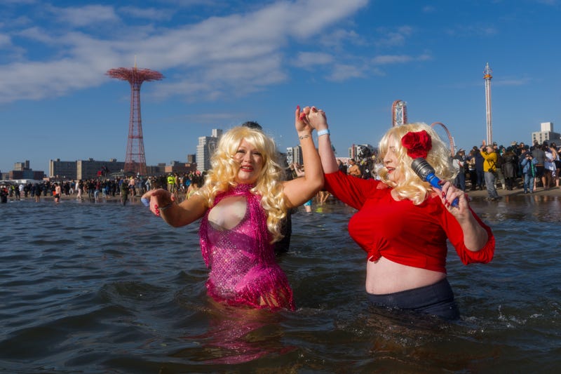 People participate in the 121st annual Polar Bear Plunge in Coney Island on January 1, 2024 in New York City. 