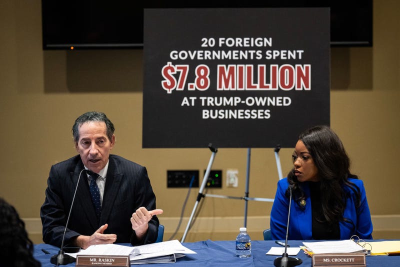 Ranking member of the House Oversight Committee Rep. Jamie Raskin (D-MD) speaks as Rep. Jasmine Crockett (D-TX) looks on during a media briefing concerning former President Donald Trump's business ties with foreign governments, on Capitol Hill January 4, 2024 in Washington, DC.
