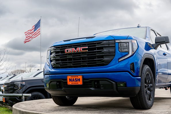 A GMC vehicle is seen for sale on the Chuck Nash dealership lot on January 03, 2024 in San Marcos, Texas.