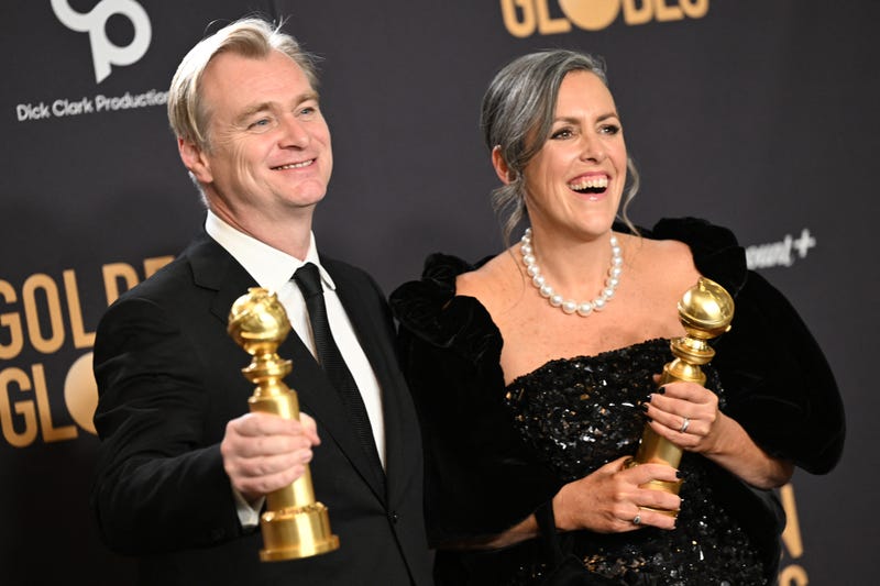 Christopher Nolan (L) and spouse British film producer Emma Thomas