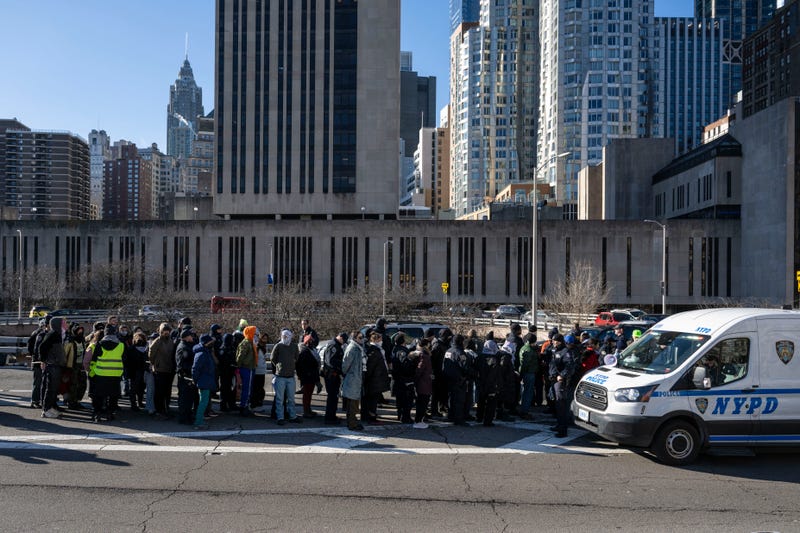 NYPD officers arrest protesters as they gathered and blocked the Manhattan entrance of the Brooklyn Bridge