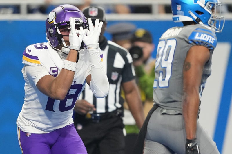 Justin Jefferson #18 of the Minnesota Vikings celebrates after a touchdown against the Lions, a team he has dominated in his eight games against them.