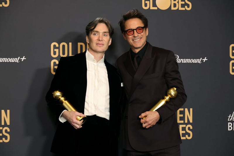 (L-R) Cillian Murphy, winner of the Best Performance by a Male Actor in a Motion Picture – Drama for "Oppenheimer," and Robert Downey Jr., winner of the Best Performance by a Male Actor in a Supporting Role in any Motion Picture award for "Oppenheimer," pose in the press room during the 81st Annual Golden Globe Awards at The Beverly Hilton on January 07, 2024 in Beverly Hills, California.