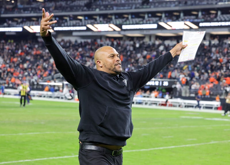 Interim head coach Antonio Pierce of the Las Vegas Raiders gestures to fans as he runs off the field after the team's 27-14 victory over the Denver Broncos at Allegiant Stadium on January 07, 2024