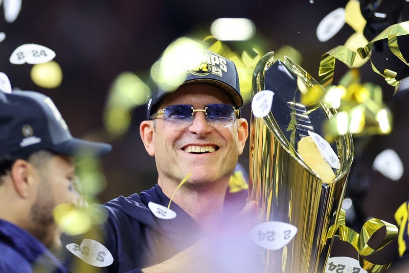 Head coach Jim Harbaugh of the Michigan Wolverines celebrates after defeating the Washington Huskies during the 2024 CFP National Championship game at NRG Stadium on January 08, 2024 in Houston, Texas. Michigan defeated Washington 34-13. 