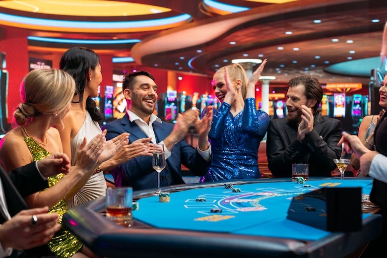 People playing blackjack inside a casino