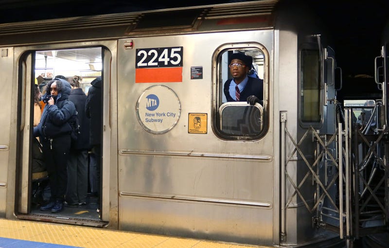 A conductor looks out from a train car at the 59th Street-Columbus Circle subway station on Jan. 11, 2024.