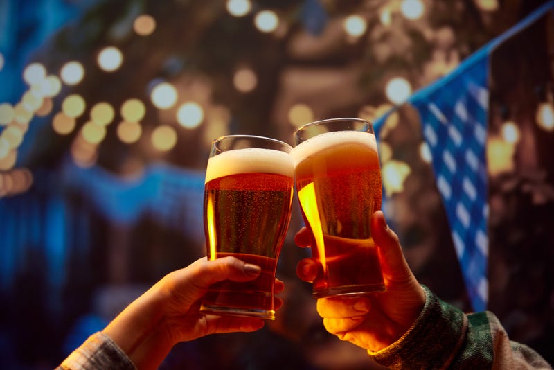FILE: Two beer glasses at a festival