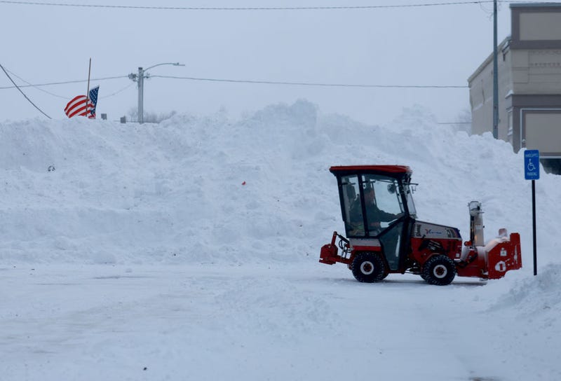 A mound of snow sits in the main street as a snowy and freezing cold weather system passes through the area on January 13, 2024, in Adair, Iowa. 