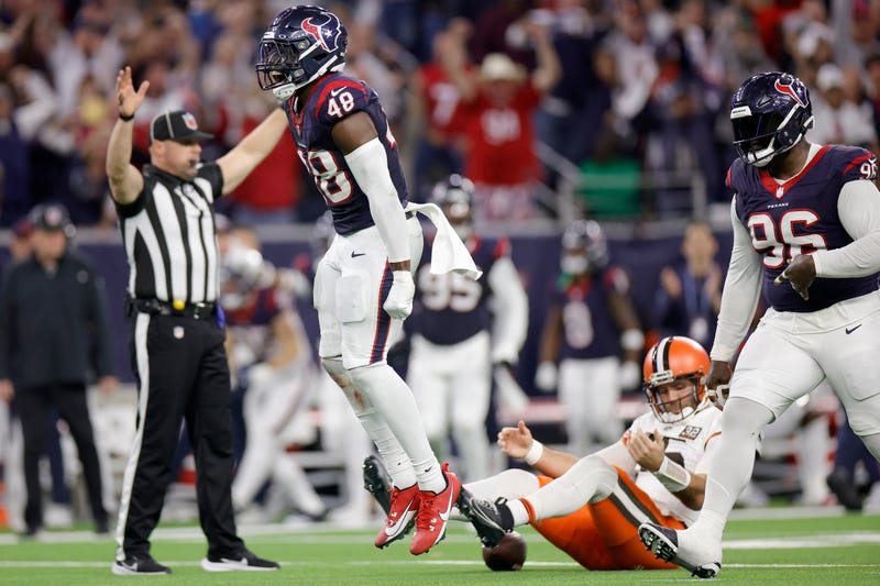 Christian Harris #48 of the Houston Texans celebrates after sacking Joe Flacco #15 of the Cleveland Browns during the third quarter in the AFC Wild Card Playoffs at NRG Stadium on January 13, 2024 in Houston, Texas.