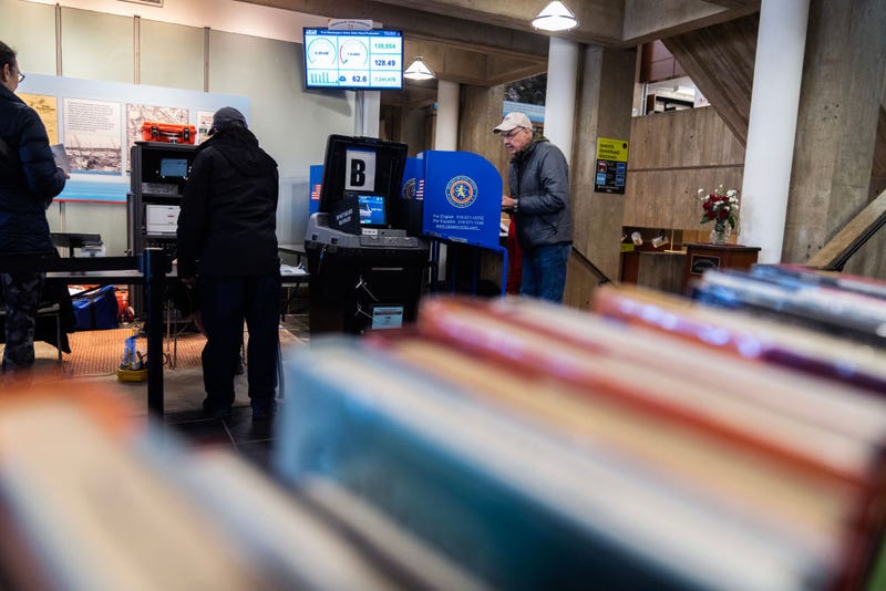 A voter casts a ballot on the first day of early voting for New York's 3rd Congressional District special election at the Port Washington Public Library, Feb, 3, 2024.