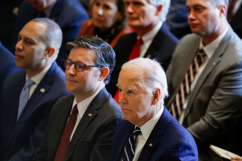 U.S. House Minority Leader Hakeem Jeffries (D-NY), U.S. Speaker of the House Mike Johnson (R-LA) and U.S. President Joe Biden listen during the annual National Prayer Breakfast in Statuary Hall in the U.S. Capitol on February 01, 2024 in Washington, DC. This is the first year the event is being hosted by the National Prayer Breakfast Foundation inside the Capitol after being controlled for decades by the Christian evangelical group the Fellowship Foundation.