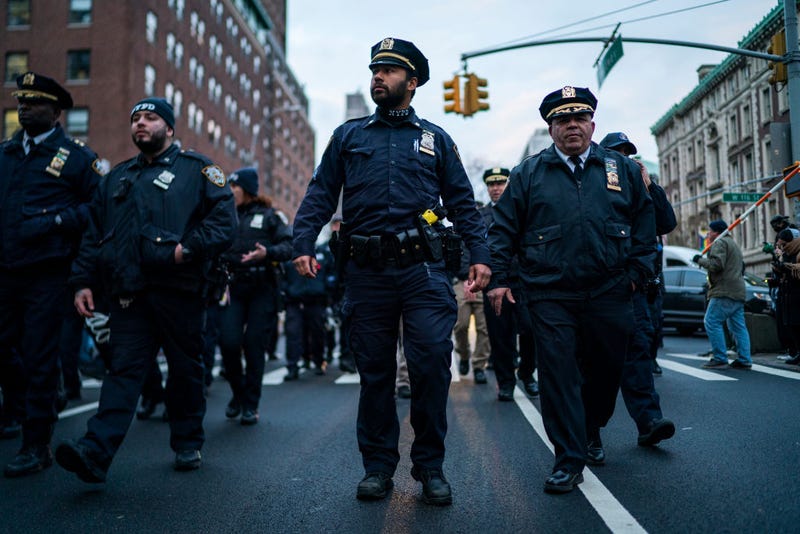 NYPD officers advance to detain some Pro-Palestinian demonstrators during a protest near Columbia University on Feb. 2, 2024.