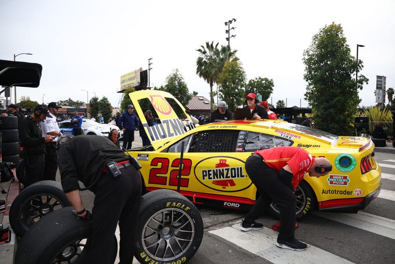 Crew members prepare the #22 Shell Pennzoil Ford, driven by Joey Logano to practice for the NASCAR Cup Series Busch Light Clash at The Coliseum at Los Angeles Memorial Coliseum on February 03, 2024 in Los Angeles, California. (Photo by Jared C. Tilton/Getty Images)