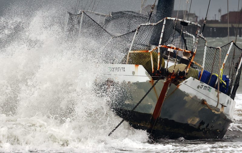  A wave hits a boat which washed ashore as a powerful long-duration atmospheric river storm, the second in less than a week, impacts California on February 4, 2024 in Santa Barbara, California. The storm is delivering potential for widespread flooding, landslides and power outages while dropping heavy rain and snow across the region.