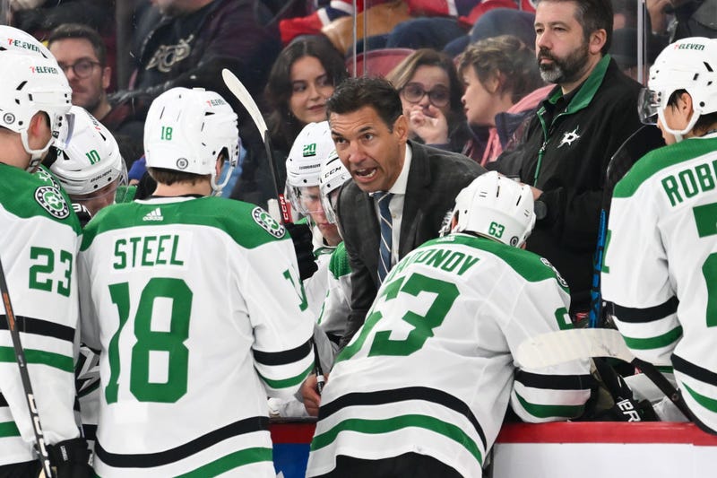 MONTREAL, CANADA - FEBRUARY 10: Assistant coach of the Dallas Stars Alain Nasreddine speaks to his team during the third period against the Montreal Canadiens at the Bell Centre on February 10, 2024 in Montreal, Quebec, Canada. The Dallas Stars defeated the Montreal Canadiens 3-2.