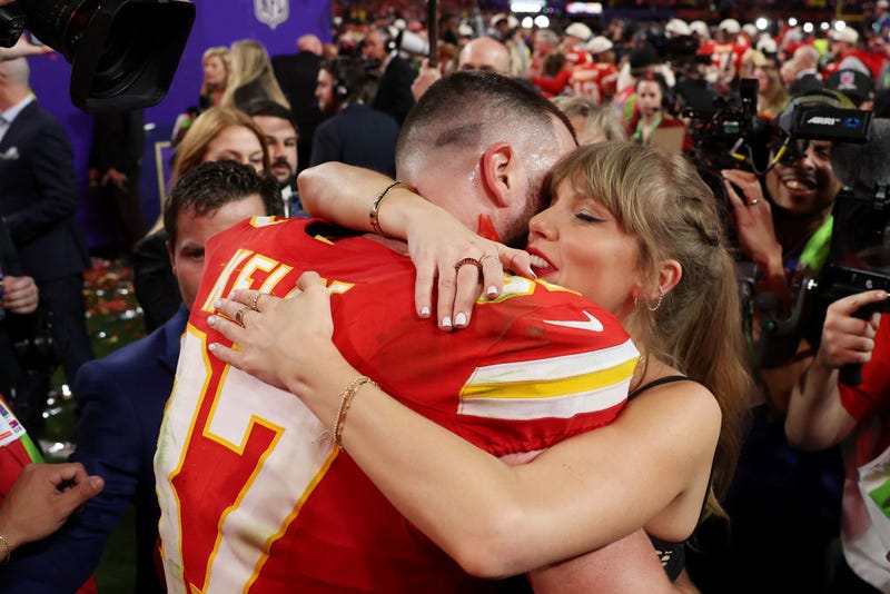 Travis Kelce #87 of the Kansas City Chiefs and Taylor Swift embrace after defeating the San Francisco 49ers in overtime during Super Bowl LVIII at Allegiant Stadium on February 11, 2024 in Las Vegas, Nevada. 