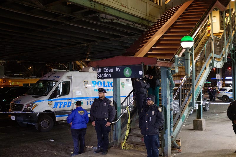 Police investigate after six people were shot at the Mount Eden Avenue subway station in the Bronx on Monday, Feb. 12, 2024