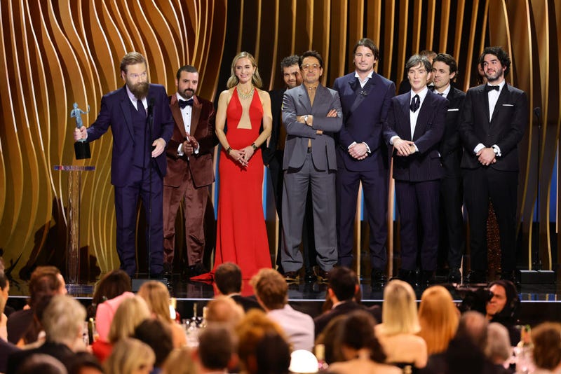  (L-R) Kenneth Branagh, David Krumholtz, Emily Blunt, Alden Ehrenreich, Robert Downey Jr., Josh Hartnett, Cillian Murphy, Casey Affleck, and Benny Safdie accept the Outstanding Performance by a Cast in a Motion Picture award for 'Oppenheimer' onstage during the 30th Annual Screen Actors Guild Awards at Shrine Auditorium and Expo Hall on February 24, 2024 in Los Angeles, California. 