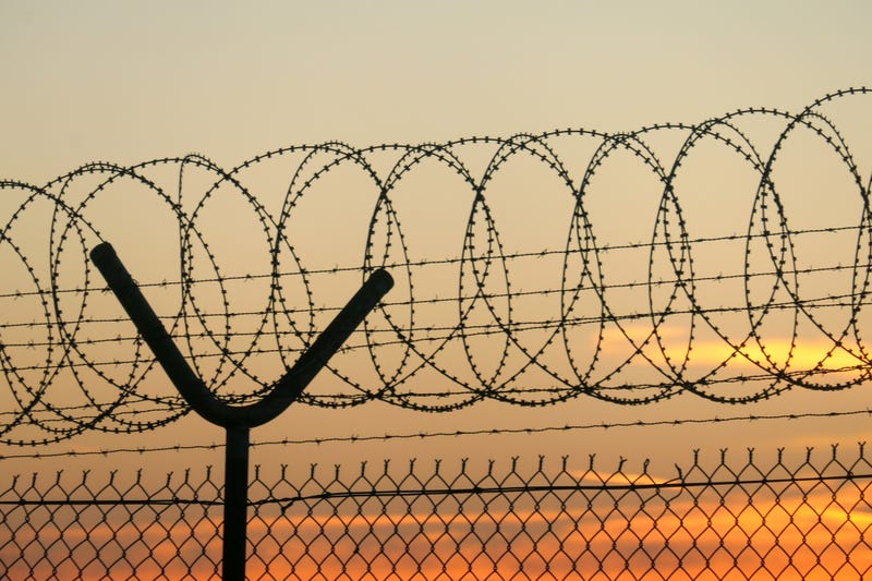 Prison fence.