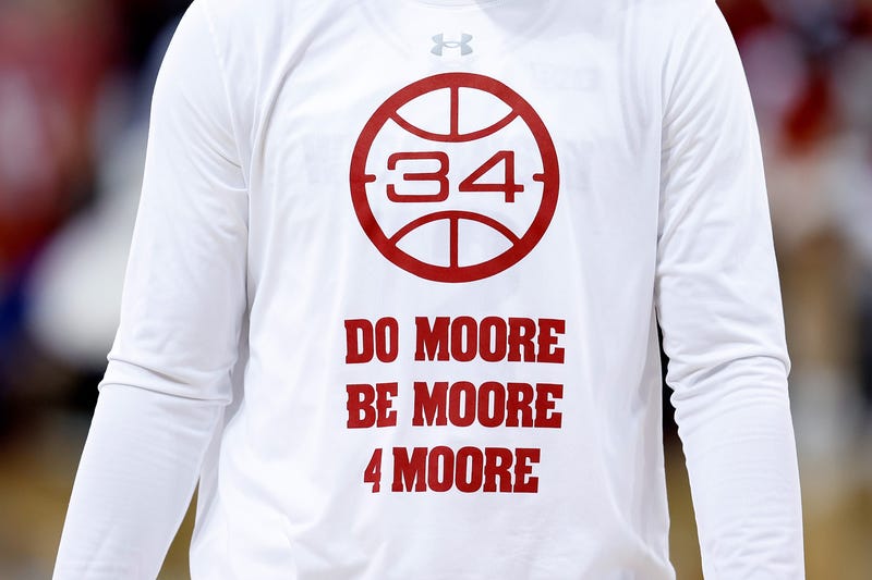 Wisconsin Badgers players wore shirts honoring Howard Moore during the game against the Illinois Fighting Illini at Kohl Center on March 02, 2024 in Madison, Wisconsin.