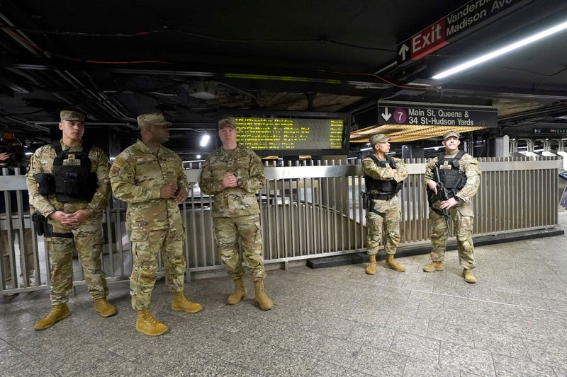 Members of the New York National patrol the subway at Grand Central Terminal on March 7, 2024