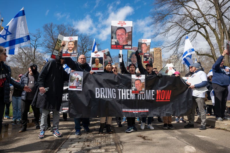 People participate in a march and rally to demand that the Israeli hostages being held in Gaza be brought home on March 10, 2024 in New York City. Holding placards and carrying Israeli flags, dozens walked through Central Park demanding that the 134 people still being held hostage in Gaza be freed. All were captured in the October 7 Hamas attack on Israel, in which over 1,000 Israelis were were killed.