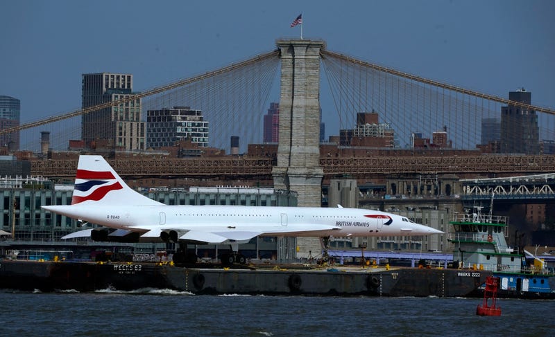The Intrepid Museum's iconic British Airways Concorde G-BOAD (Alpha Delta) supersonic jet goes under the Brooklyn Bridge, in New York on March 13, 2024 as it makes its way to Weeks Marine in Jersey City for storage overnight