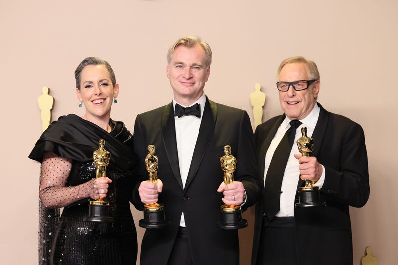 Emma Thomas, Christopher Nolan, and Charles Roven