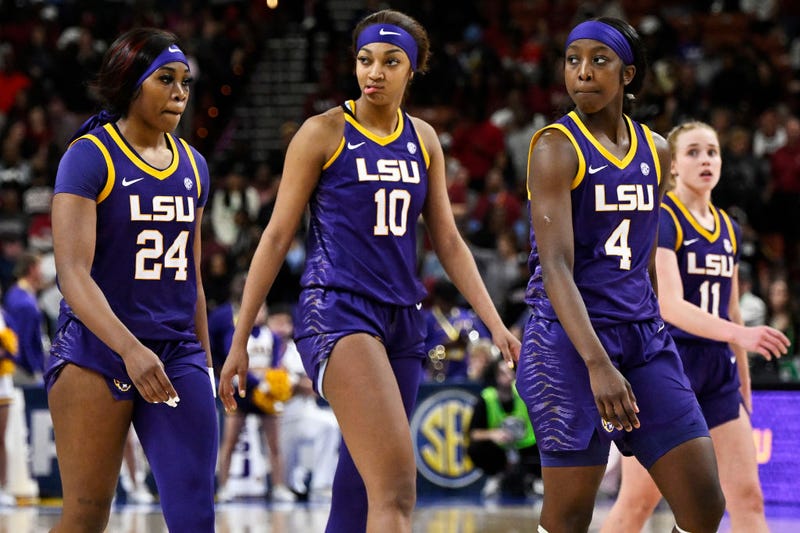 Aneesah Morrow #24, Angel Reese #10, Flau'jae Johnson #4, and Hailey Van Lith #11 of the LSU Lady Tigers stand on the court against the South Carolina Gamecocks in the fourth quarter during the championship game of the SEC Women's Basketball Tournament at Bon Secours Wellness Arena on March 10, 2024 in Greenville, South Carolina. (Photo by Eakin Howard/Getty Images)