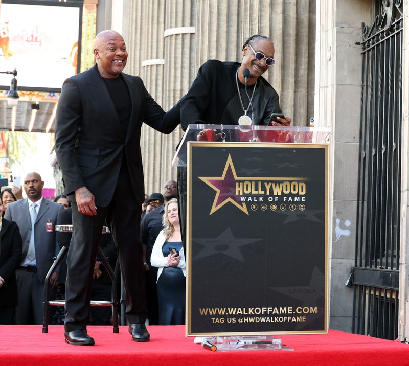 Honoree Dr. Dre and Snoop Dogg speak during the Hollywood Walk of Fame Star Ceremony for Dr. Dre 