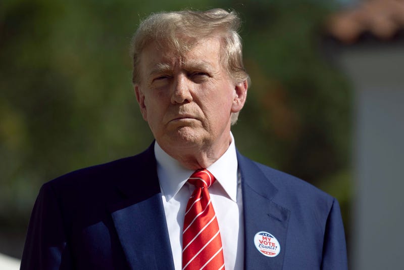 Former U.S. President Donald Trump speaks to the media after voting at a polling station setup in the Morton and Barbara Mandel Recreation Center on March 19, 2024, in Palm Beach, Florida. Trump, along with other registered Republican voters, cast ballots in the Presidential Preference Primary. There wasn't a ballot or election for Democrats since the Florida Democratic Party only provided the name of Joseph R. Biden Jr.
