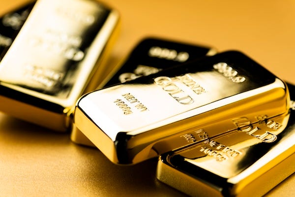 Gold bars against a golden background
