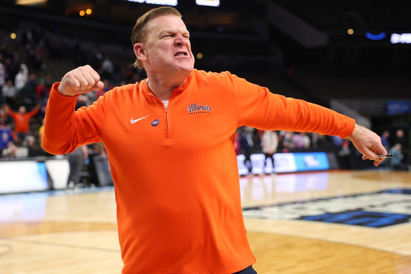 Head coach Brad Underwood of the Illinois Fighting Illini celebrates after defeating the Duquesne Dukes 89-63 in the second round of the NCAA Men's Basketball Tournament at CHI Health Center on March 23, 2024, in Omaha, Neb.