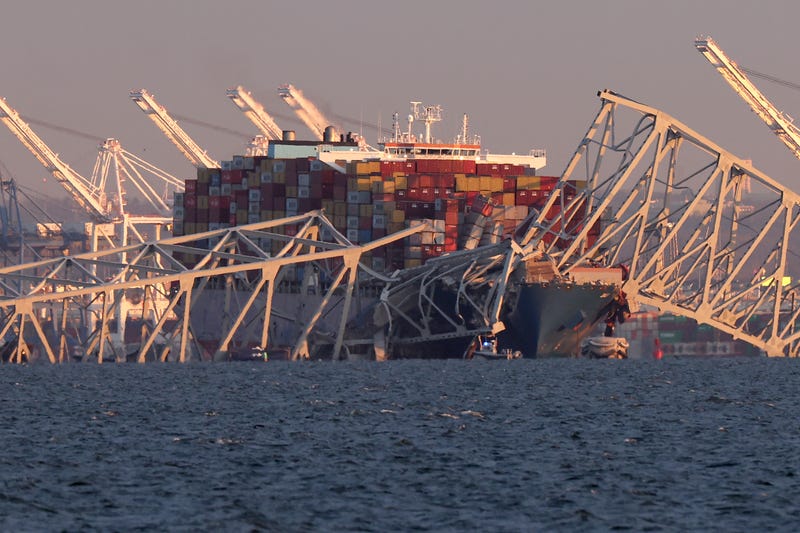  A cargo ship is shown after running into and collapsing the Francis Scott Key Bridge on March 26, 2024 in Baltimore, Maryland. Rescuers are searching for at least seven people, authorities say, while two others have been pulled from the Patapsco River.