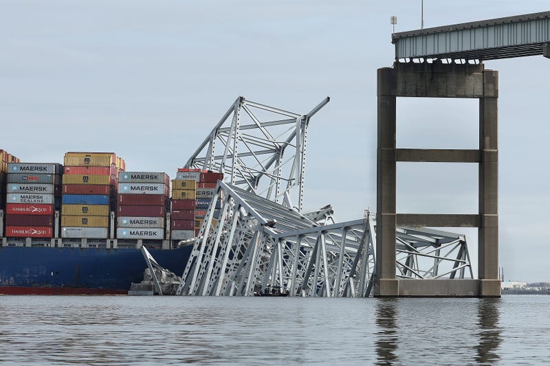 The cargo ship Dali sits in the water after running into and collapsing the Francis Scott Key Bridge on March 26, 2024, in Baltimore.