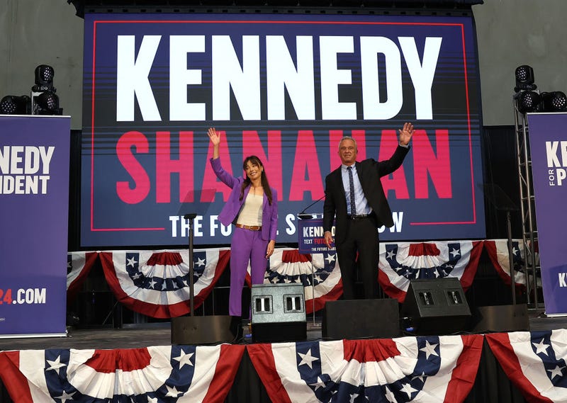 Independent presidential candidate Robert F. Kennedy Jr. (R) and his vice presidential pick Nicole Shanahan (L) greets supporters during a campaign event to announce his pick for running mate at the Henry J. Kaiser Event Center on March 26, 2024 in Oakland, California.