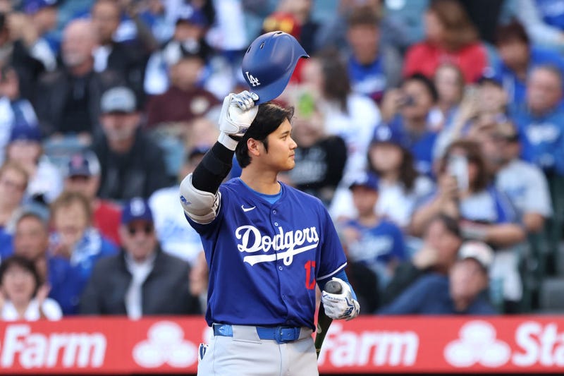 Shohei Ohtani #17 of the Los Angeles Dodgers acknowledges the crowd after the Los Angeles Angels played a tribute video in the first inning of a game between the Los Angeles Angels and the Los Angeles Dodgers at Angel Stadium of Anaheim on March 26, 2024 in Anaheim, California.