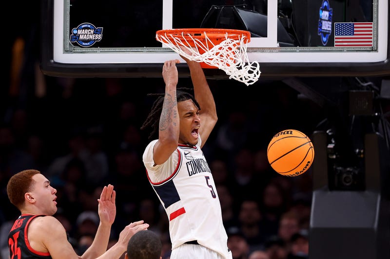 Stephon Castle #5 of the Connecticut Huskies dunks the ball against the San Diego State Aztecs during the second half in the Sweet 16 round of the NCAA Men's Basketball Tournament at TD Garden on March 28, 2024 in Boston, Massachusetts.