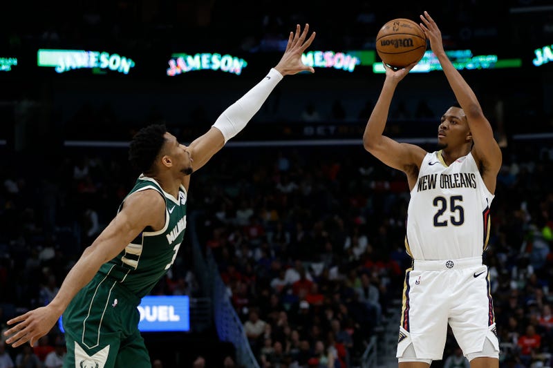 Trey Murphy III #25 of the New Orleans Pelicans shoots the ball over Giannis Antetokounmpo #34 of the Milwaukee Bucks at Smoothie King Center on March 28, 2024 in New Orleans, Louisiana.