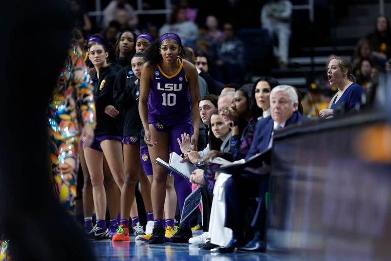 Angel Reese #10 of the LSU Tigers looks on from the bench in a game against the UCLA Bruins during the second half in the Sweet 16 round of the NCAA Women's Basketball Tournament at MVP Arena on March 30, 2024 in Albany, New York. The LSU Tigers won, 78-69.