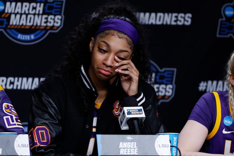 Angel Reese #10 of the LSU Tigers speaks with the media after losing to the Iowa Hawkeyes 94-87 in the Elite 8 round of the NCAA Women's Basketball Tournament at MVP Arena on April 01, 2024 in Albany, New York. 