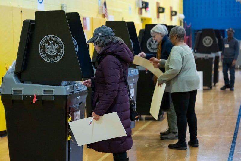 People cast their ballots in a polling station during the state presidential primary election on April 2, 2024 in Manhattan.