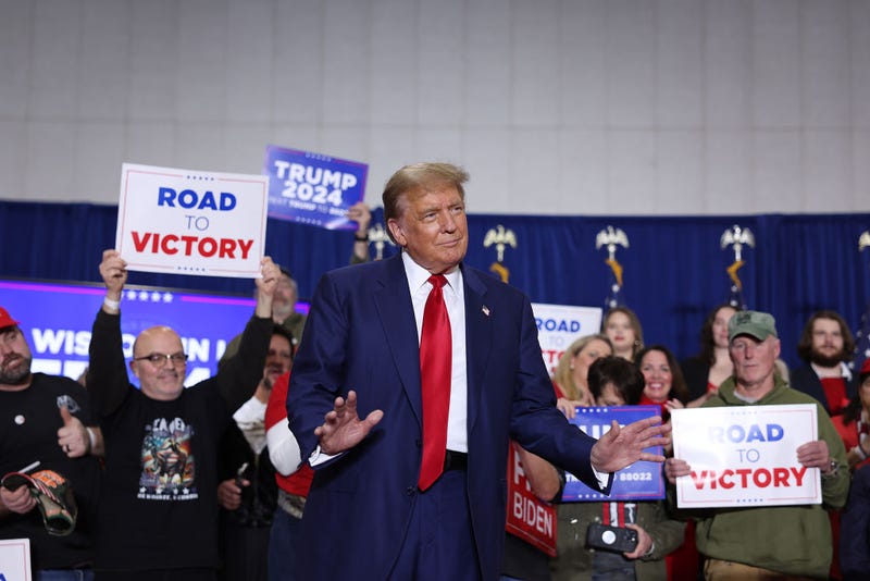 Former President Donald Trump arrives for a rally on April 02, 2024 in Green Bay, Wisconsin. At the rally, Trump spoke next to an empty lectern on the stage and challenged President Joe Biden to debate him. The Wisconsin primary is being held today. 