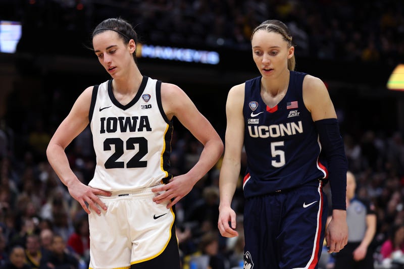 CLEVELAND, OHIO - APRIL 05: Caitlin Clark #22 of the Iowa Hawkeyes and Paige Bueckers #5 of the UConn Huskies look on in the second half during the NCAA Women's Basketball Tournament Final Four semifinal game at Rocket Mortgage Fieldhouse on April 05, 2024 in Cleveland, Ohio. (Photo by Steph Chambers/Getty Images)
