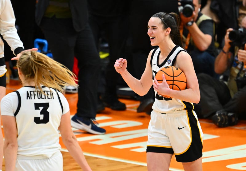 Caitlin Clark celebrates