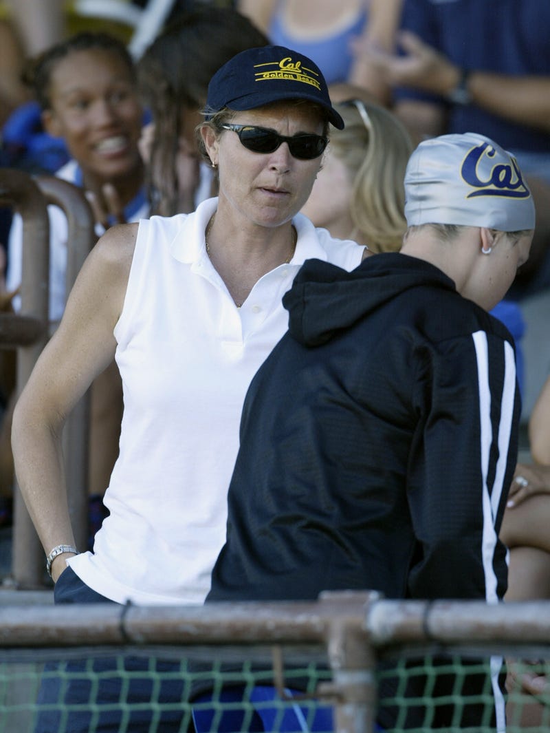 Natalie Coughlin's coach Teri McKeever talks to her before the finals of the womens 100 meter backstroke during the 36th Santa Clara International Swim Meet at the George Haines International Swim Center on June 28, 2003 in Santa Clara, California.