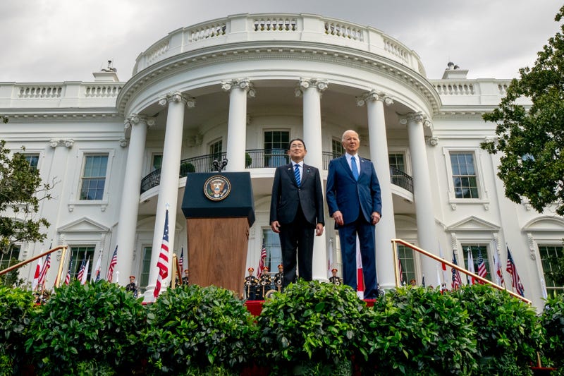 President Joe Biden and Japanese Prime Minister Fumio Kishida stand for their national anthems during an arrival ceremony at the White House on April 10, 2024