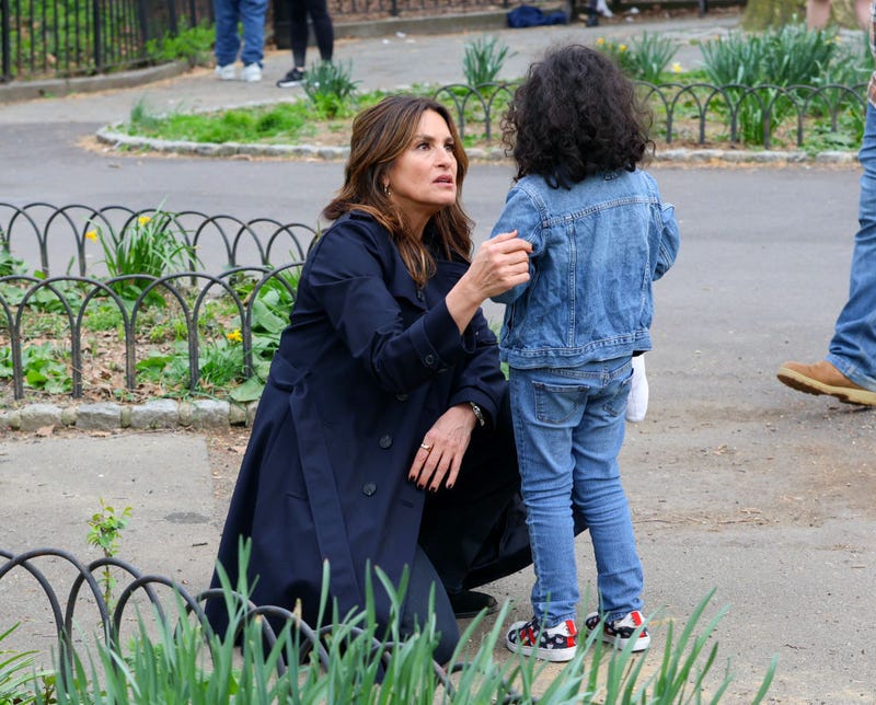 Mariska Hargitay is seen taking a break from filming 'Law and Order: SVU' help a child at the Fort Tryon Playground on April 10, 2024 in New York City.